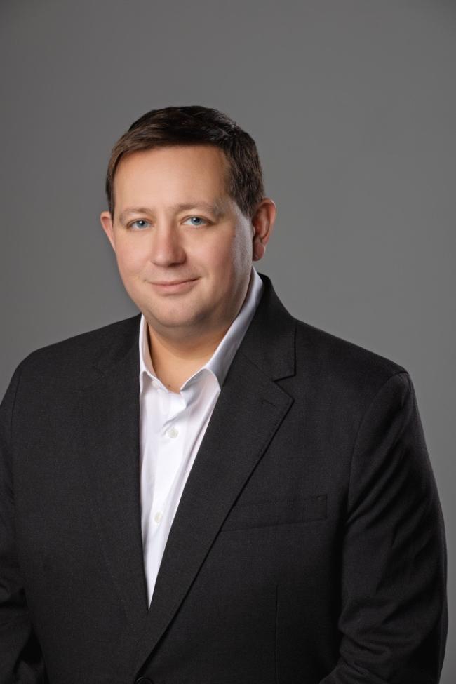 Peter Newbould headshot, CEO of Lagardère Travel Retail UK