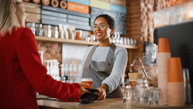 Woman working at a coffee